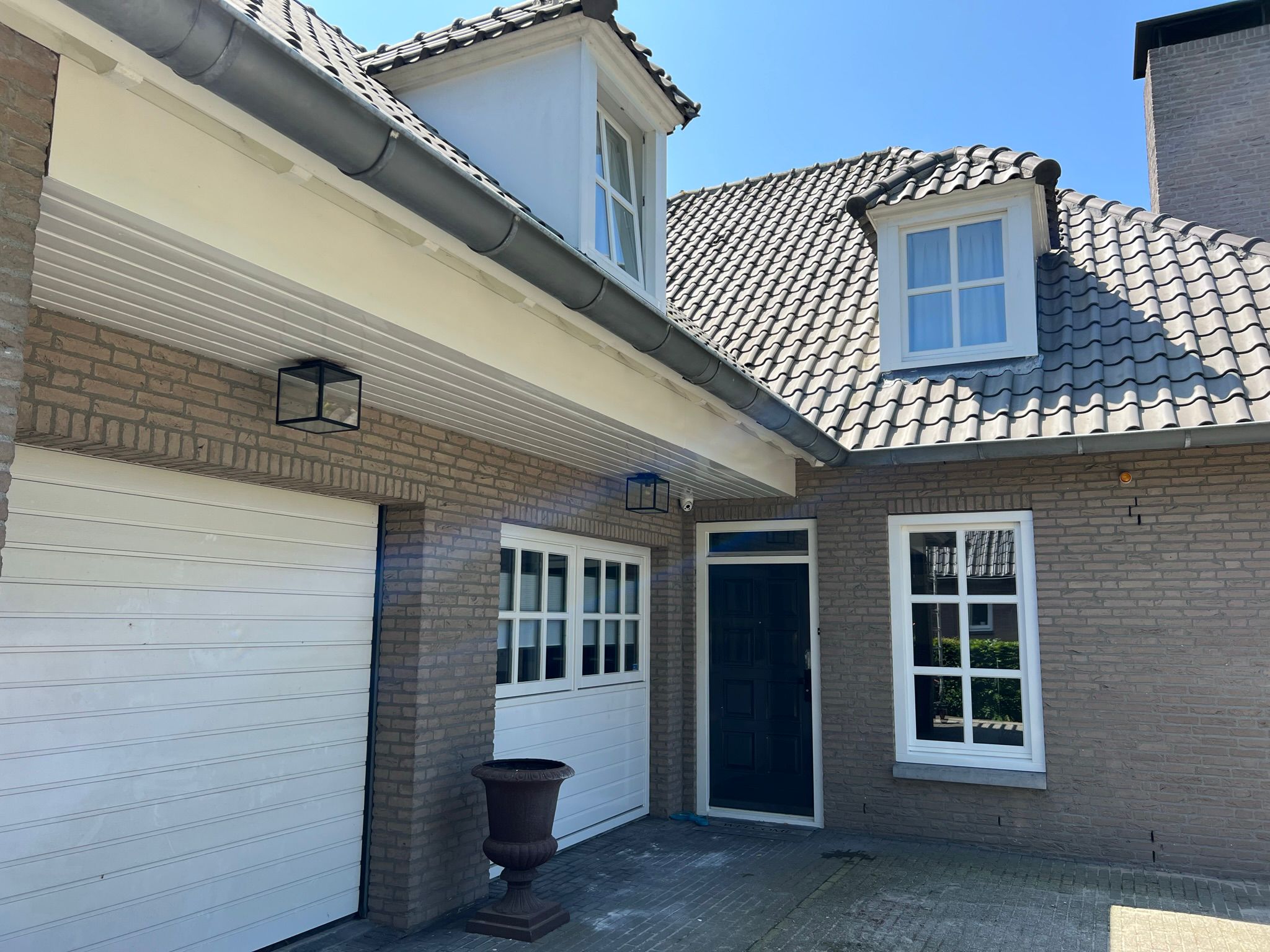 Modern bathroom sink with black faucets