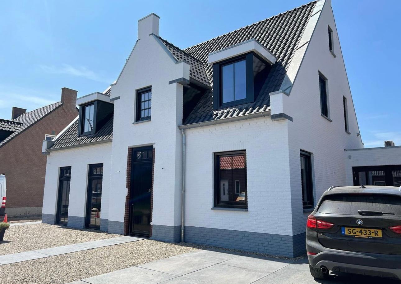 Modern bathroom sink with black faucets